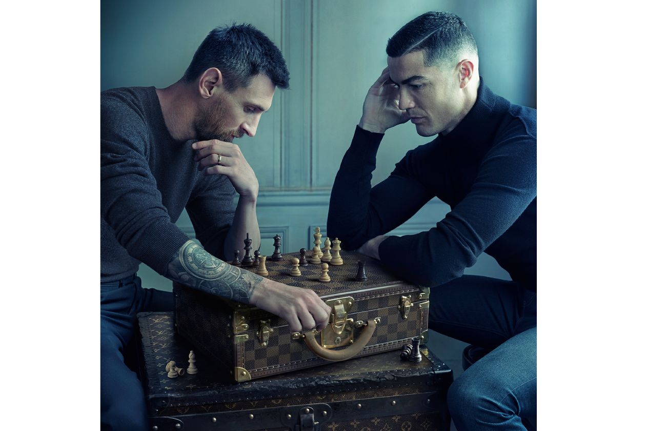 Lionel Messi and Cristiano Ronaldo Pose Over a Chessboard in Paid