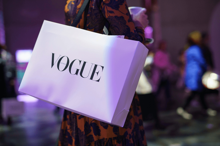 Vogue Codes Photograph Showing White Shopping Bag With Logo